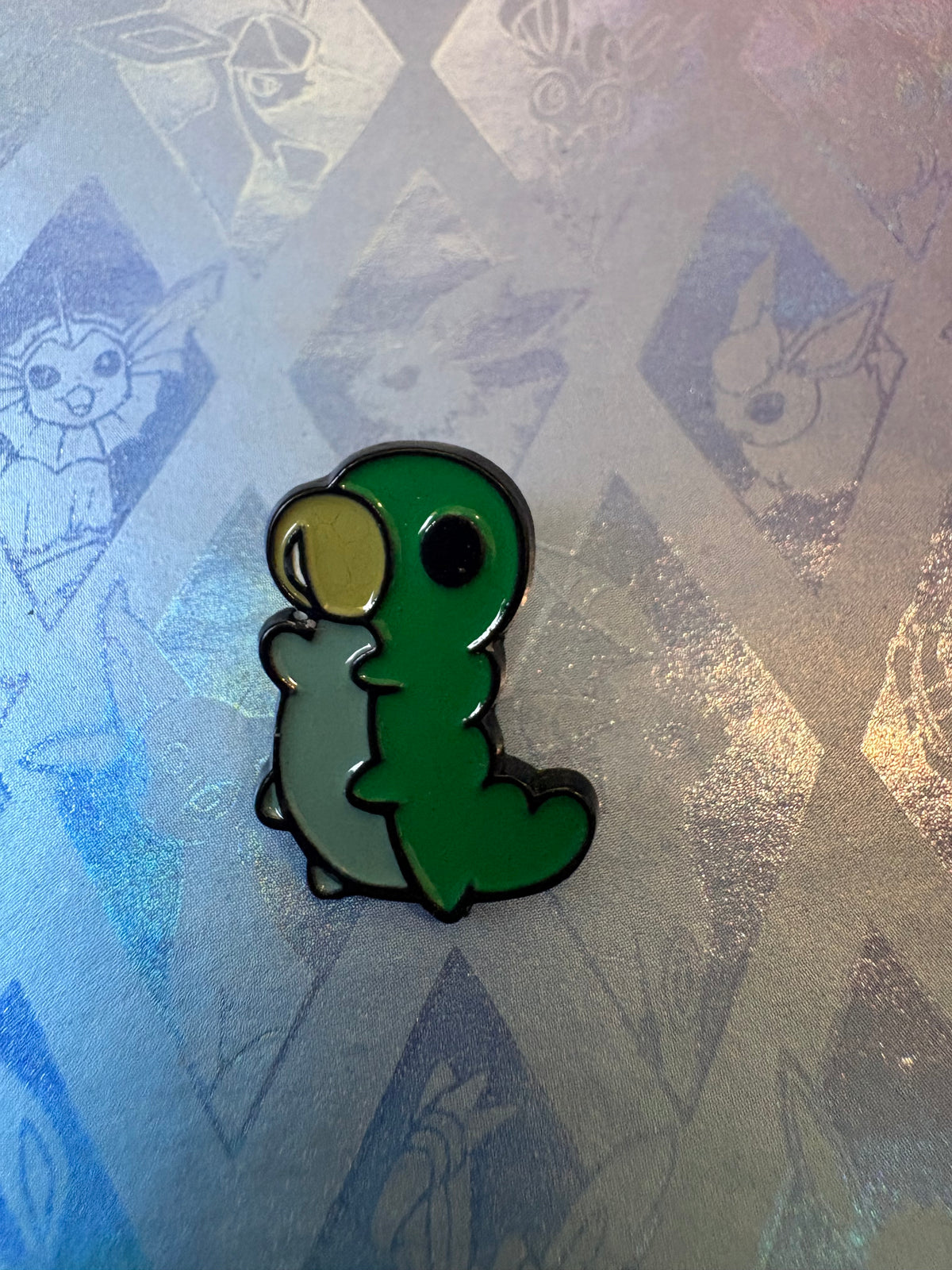 Pin metálico Grubb