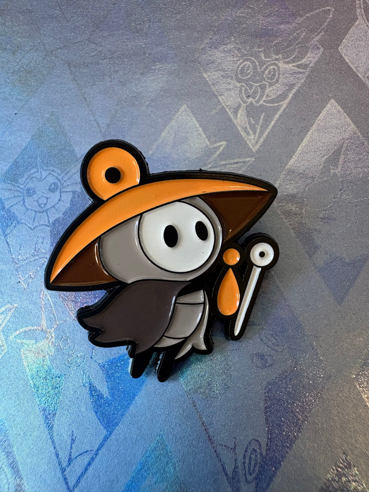 Pin metálico Sherma