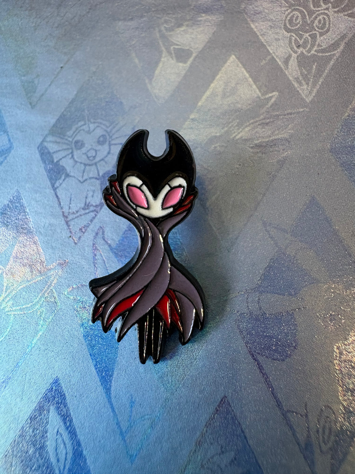 Pin metálico Grimm