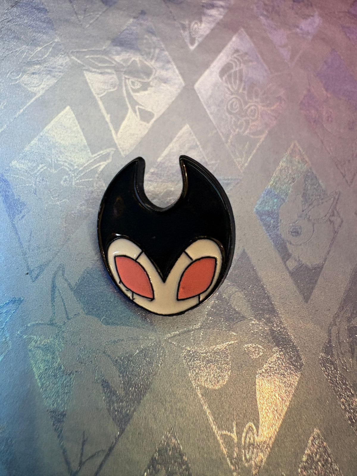 Pin metálico Grimm